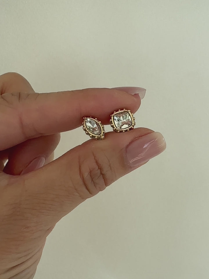 Set of gold and crystal stud earrings